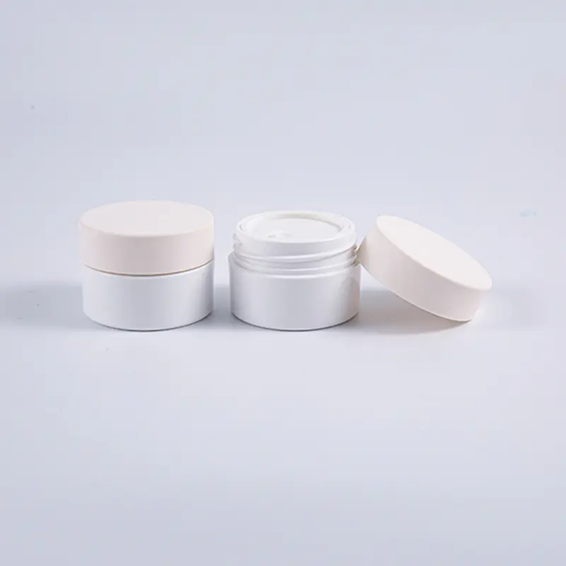 Borcan rotund pentru cremă PETG alb de 10 g